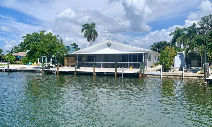 Isles of Capri Condo | Direct water access with boat lift, 5 min to ocean. Cozy Cottage!