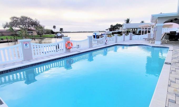 Cocoa Beach House | "Dive Into Fun! Spring & Summer Deals at Dolphin Cove – Walk to It All!"