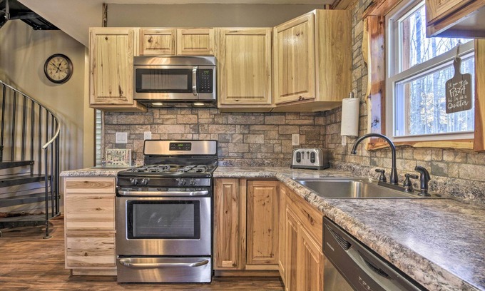 Pittsville Cottage | Dock + Boat Slip: Stylish Cabin on Leesville Lake