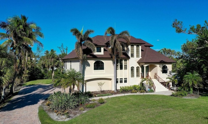Sanctuary House | Dockside Dream at Ding Darling: Pool Home w Dock!