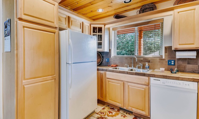 Pagosa Highlands House | Dog-friendly home among the trees w/ fireplace, yard, & large deck