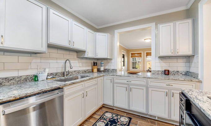 Morehead City Cottage | Dog-friendly home with updated interior, old-world charm, and alfresco dining