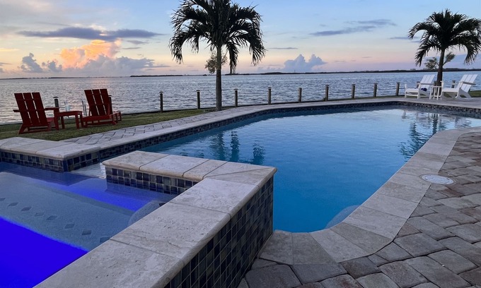 Cocoa Isles Country Club House | Dolphin Paradise-5 BDRM-Riverfront-Pool-Game Room