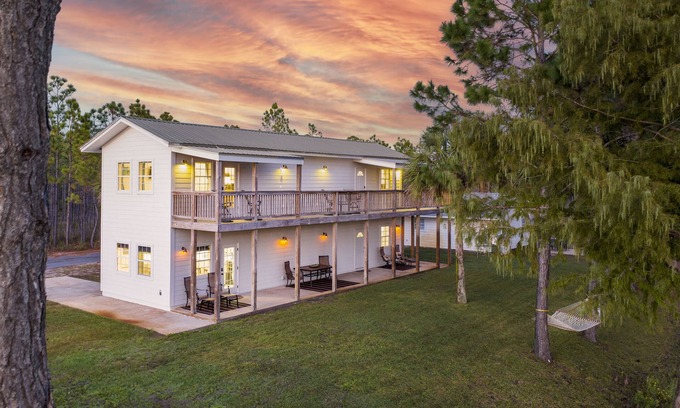 Santa Rosa Beach House | Downstairs lake front unit minutes from the beach! Bonfire, hammock, BBQ, fish!