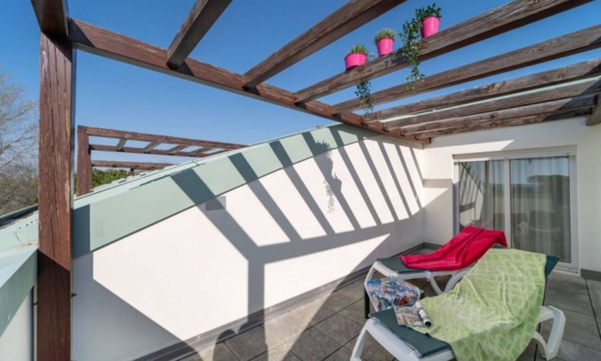 Bibione Apartment | Elegant duplex apartment with shared pool