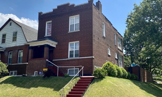 St. Louis House | Elegant home with pool, fenced yard, full kitchen & theater.