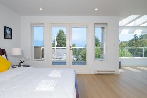 West Point Grey Villa | Elegant Spanish Villa with Ocean & Mountain Views