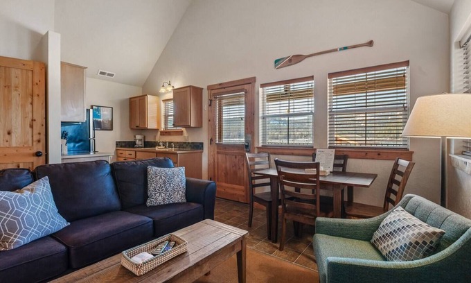 Dover House | Embrace lakeside serenity at this cozy Dover Bay bungalow, just steps from the water, perfect for couples or families seeking peaceful Idaho charm.