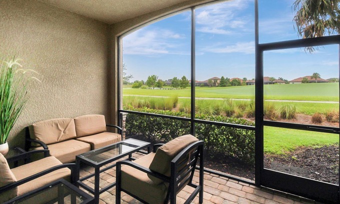 Lakewood Ranch Condo | Enjoy views of the immaculate green from your screened lanai at Lakeside National - Golfside Escape