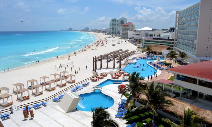 Punta Cancun Hotel | Enjoy waking up on the beach! Great location.