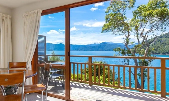 Whatamango Bay Cottage | Epic view Whatamango Bay waterfront cottage
