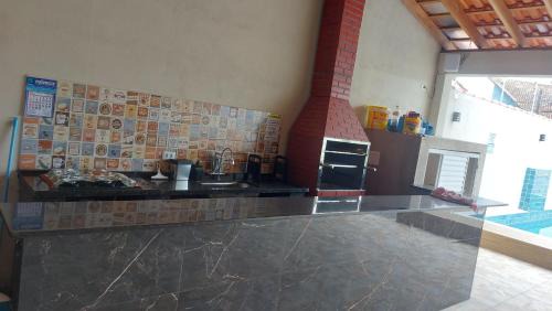 Conjunto Habitacional Guapiranga House | Espaço família