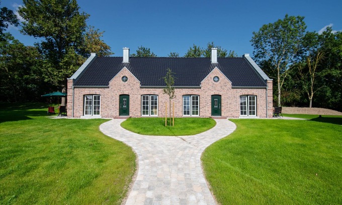 Fehmarn House | Exclusive holiday home with fireplace and sauna, terrace and beach chair, 4 persons