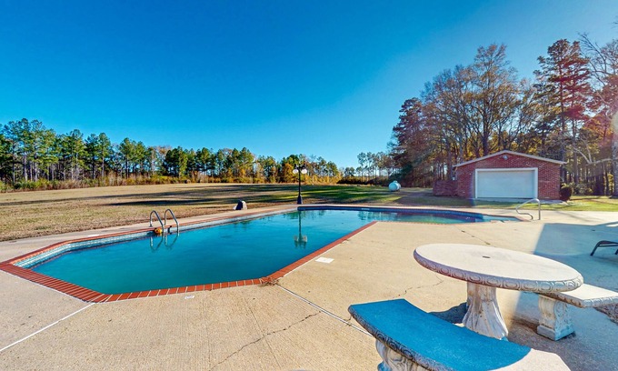 Magnolia House | Expansive property with two homes, ponds, pool, game tables, & hiking trails
