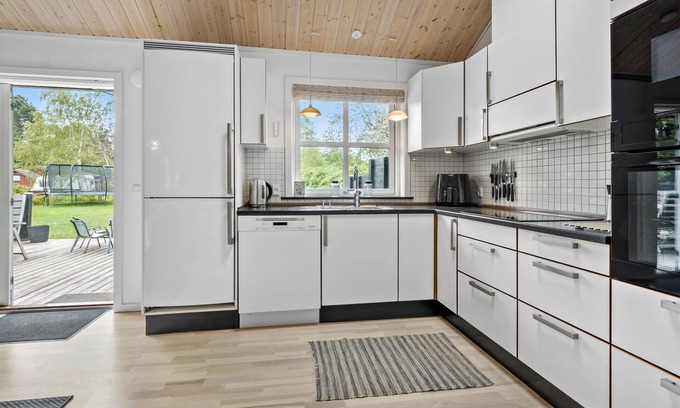Hoensinge House | Experience a relaxing vacation in this classic Danish vacation home.
