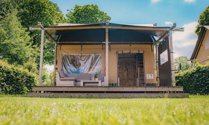 Voorthuizen House | Experience luxury glamping in the Safari Lodge at De Boshoek Holiday Park, with a private bathroom and playground for the kids, in the heart of the Veluwe.