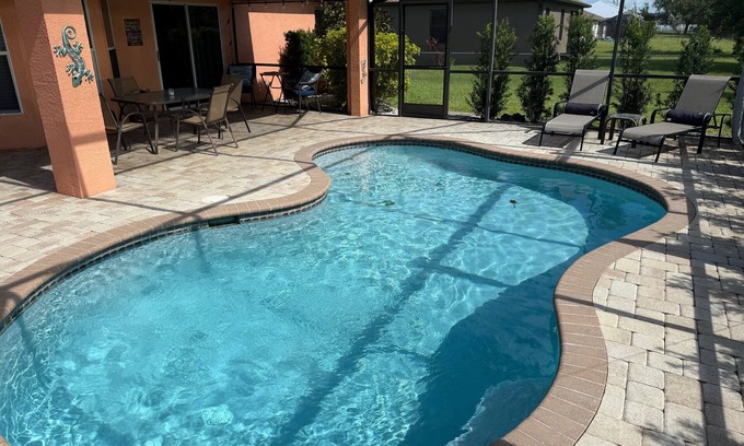 Trafalgar House | Family-friendly home. Heated pool w/lanai. Close to Pine Island, beaches & golf