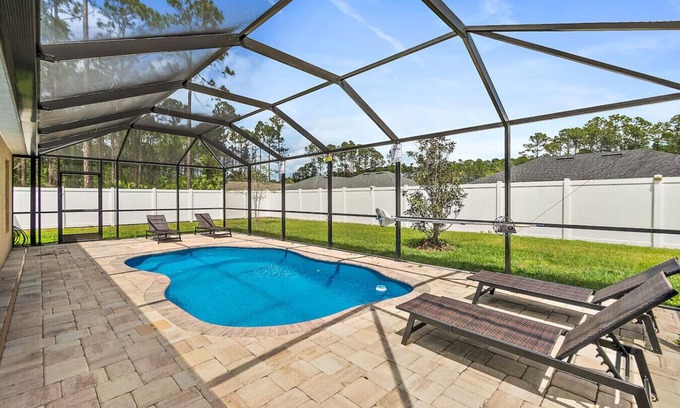 Palm Coast Apartment | Family Pool Retreat Sleeps 10 Near Beach BBQ
