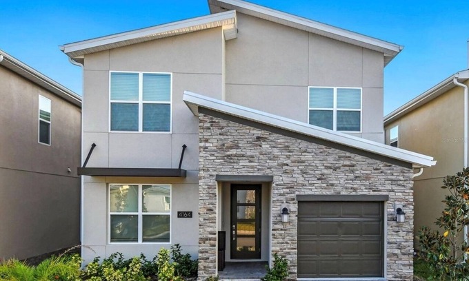 Kissimmee Villa | Fantastic 5 BR/5 BA villa with Pool in Storey Lake Sleeping 15