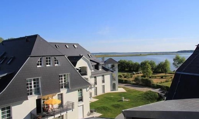 Balm Apartment | Fantastic apartment with a view of the lake, directly at the backwaters and golf club