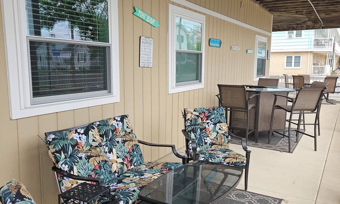 Wildwood Crest Condo | FEEL THE OCEAN BREEZE ON THE LARGE PORCH WHILE ENJOYING YOUR FAVORITE BEVERAGE