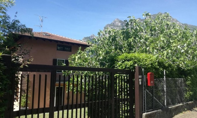 Riva del Garda Apartment | Flat with garden in quiet green neighborhood, 2 bikes, storage, private parking