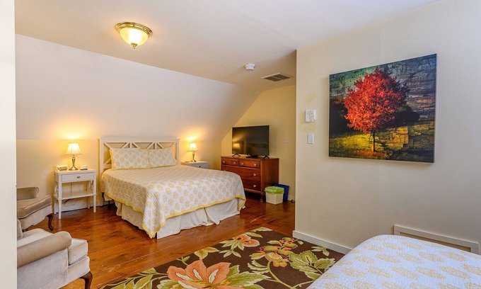 Stowe Bed & Breakfast | Friends and Family room with 2 queen beds, sitting area with full service breakfast included