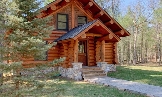 Baldwin Cabin | Full Scribed Log Cabin Nestled in along the banks of the Pere Marquette