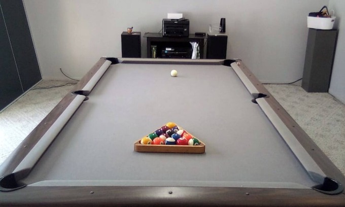 Southfield House | Fun House 2 with a Pool table on main floor game room with walk out patio door.