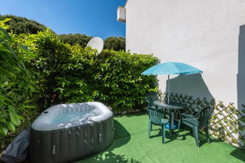 Eraclea Mare Apartment | Ginestra Deluxe Idromassaggio privato e piscina