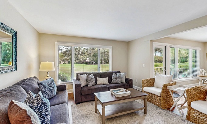 West Beach Village House | Golf-view villa with private deck, AC, & W/D - walk to beach - dog-friendly