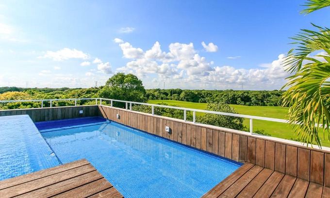 Villa Juarez Apartment | Golfers' Paradise at Nick Price Residences!