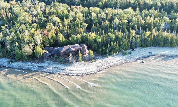 Cheboygan House | Gorgeous 6-bedroom house on Lake Huron featuring on-site rentals