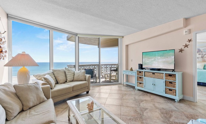 New Smyrna Beach Condo | Gorgeous Oceanfront View! Walking distance to dining & shopping!