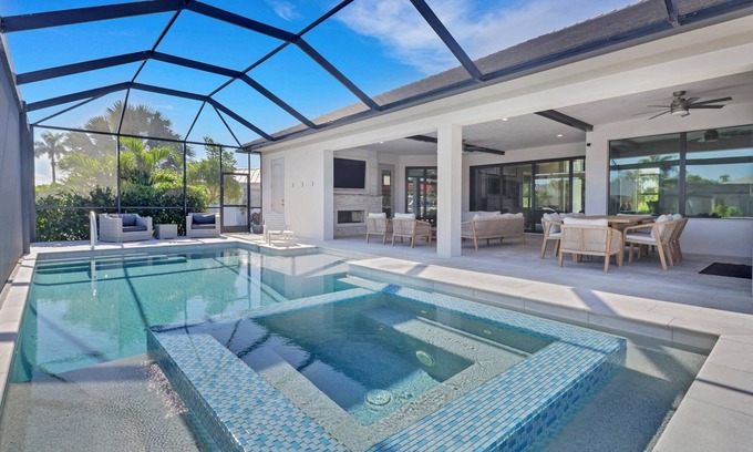 Pelican House | Gorgeous Waterfront Retreat! Stunning Outdoor Space w/Heated Pool, Spa & Outdoor Kitchen!