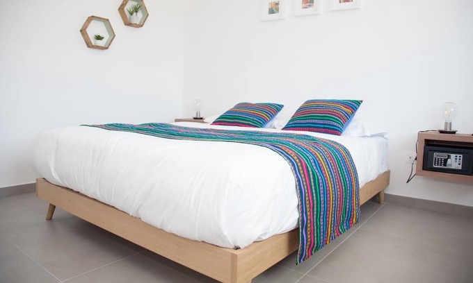 Fuorigrotta Apartment | Green apartment with double bedroom and living room / kitchen with sofa bed and private bathroom