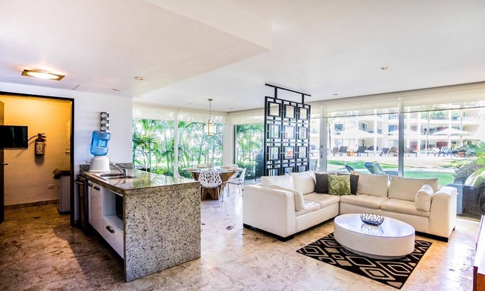 Puerto Juarez Condo | Ground floor right off the huge Infinity Pool at The Elements by BRIC