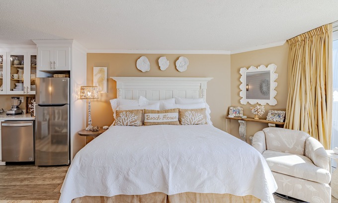 Panama City Beach Condo | Ground Floor Beachside Studio Condo with Patio and Free Beach Service.