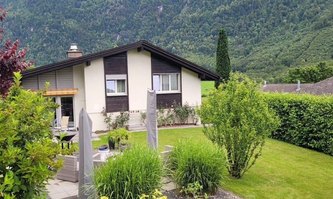 Schwanden House | Guest room "Vreneli" with terrace