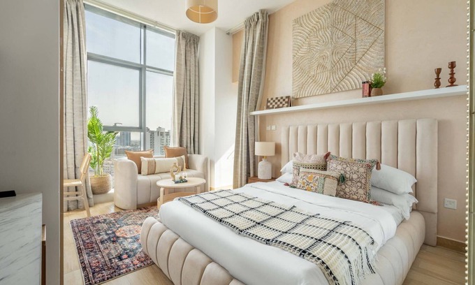 Jumeirah Village Circle Apartment | GuestReady - Arabic Charm | Balcony | Regina Tower