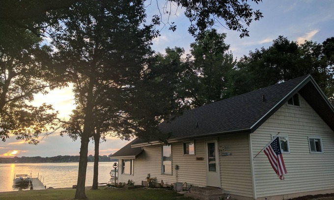 Lindstrom Cabin | Hamptons style Lake house on Sunset point. With water on both the east and west!