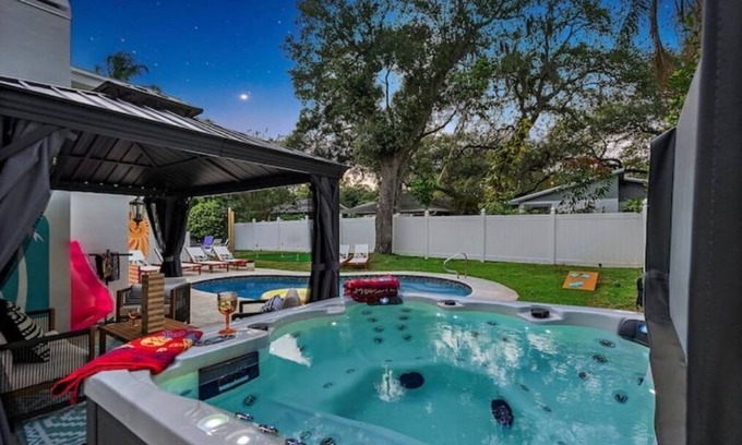 Clearwater House | Heated Pool Beach House Hot Tub, Fire Pit, Games