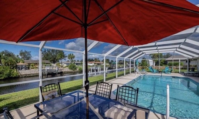Port Charlotte House | Heated Pool, Canal Front, Kayaks - Paradise Awaits!