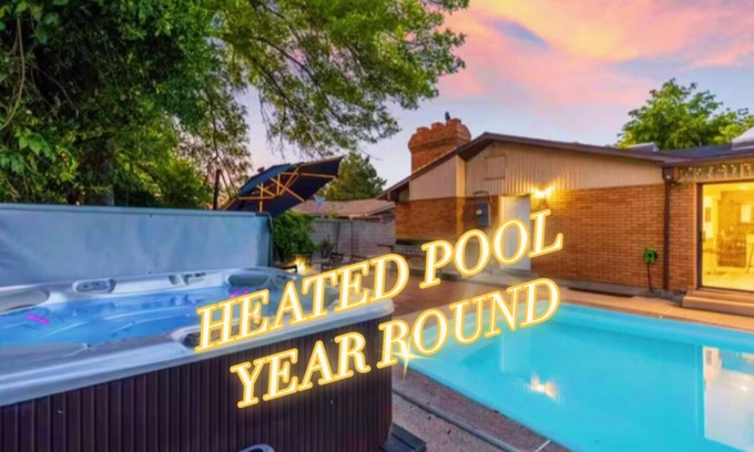 West Valley City House | Heated Pool & Hot Tub open all year with King Beds, Bar & Much More