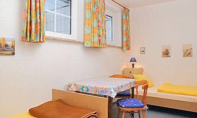 Norddorf Apartment | Heckenrose 6 -souterrain Links