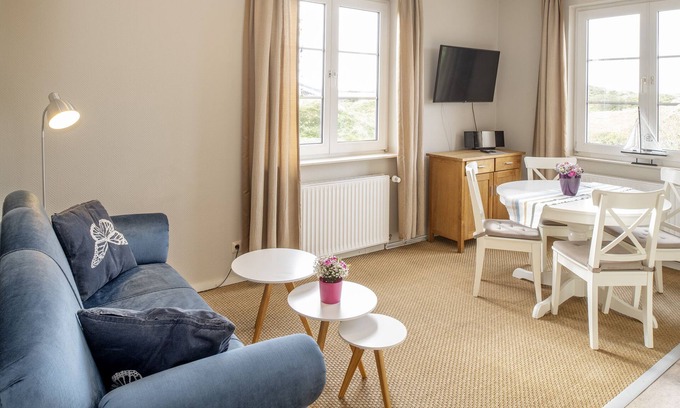 Langeoog Apartment | Helle Ferienwohnung auf Langeoog mit Gartennutzung für bis zu Vier Personen