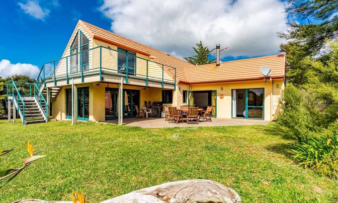 Mangawhai House | Hilltop Retreat - This large home with views in a serene setting is a great spot for your next family retreat