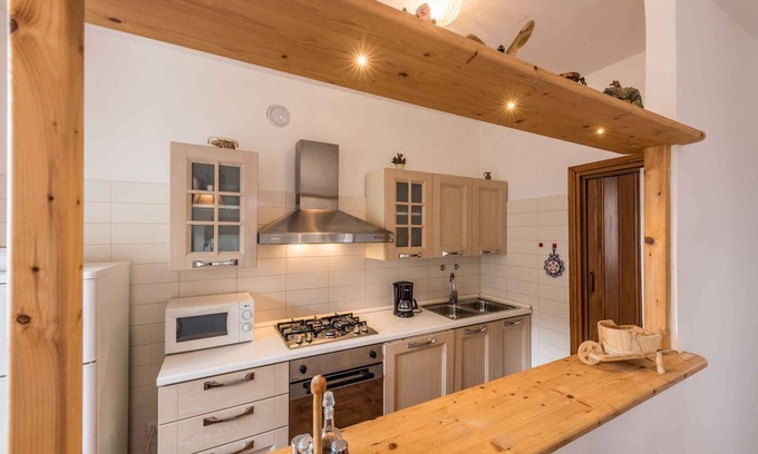 Ledro Apartment | Holiday apartment with a balcony overlooking the mountains