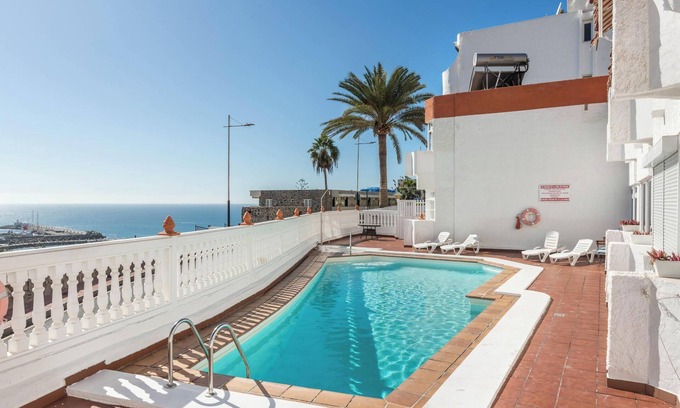 Puerto Rico Apartment | Holiday Apartment ‘Sweet Home’ with Air Conditioning, Terrace & Shared Pool