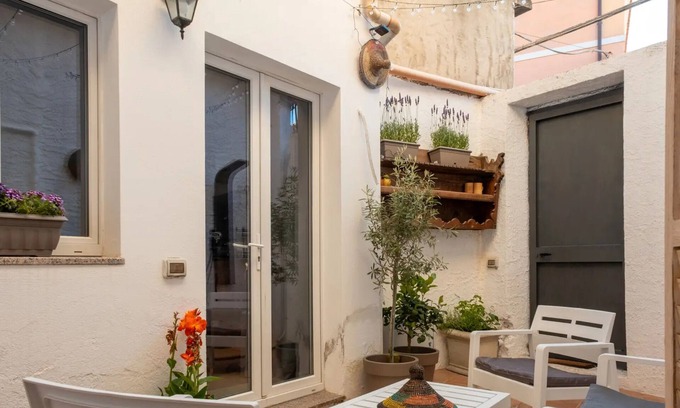 Teulada House | Holiday Home 'Barbara' with Private Garden, Wi-Fi and Air Conditioning